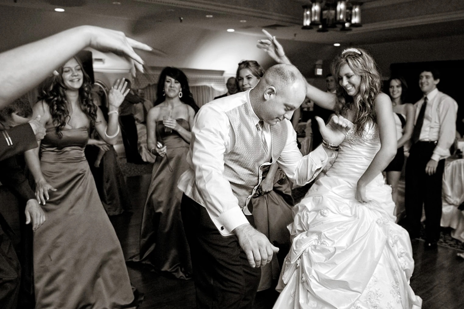 Bride and groom dance floor moment in black and white